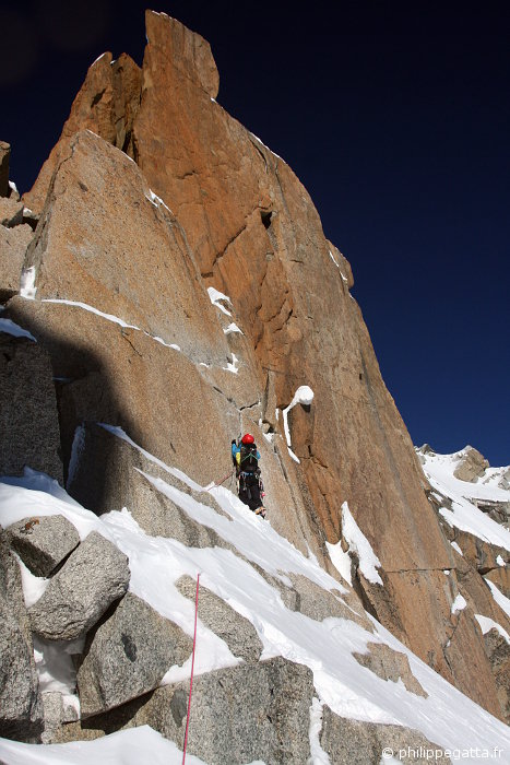 Anna in the crux of Cosmiques ridge (© P. Gatta)