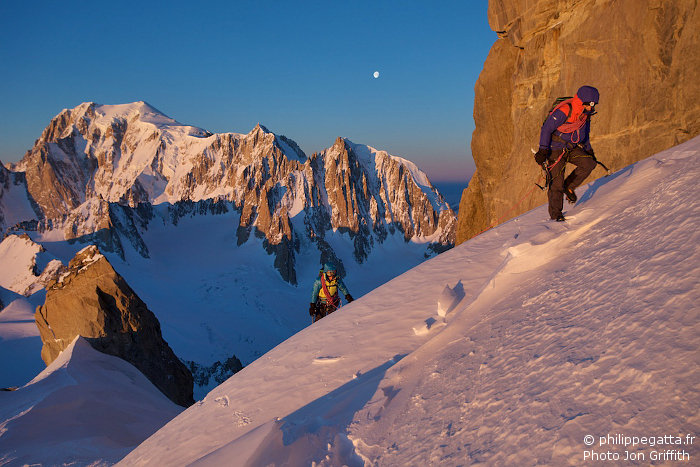 Sunrise at the base of Dent du Geant. The moon over Mont Blanc du Tacul. Mont Maudit and Mont Blanc on the left (Photo J. Griffith)
